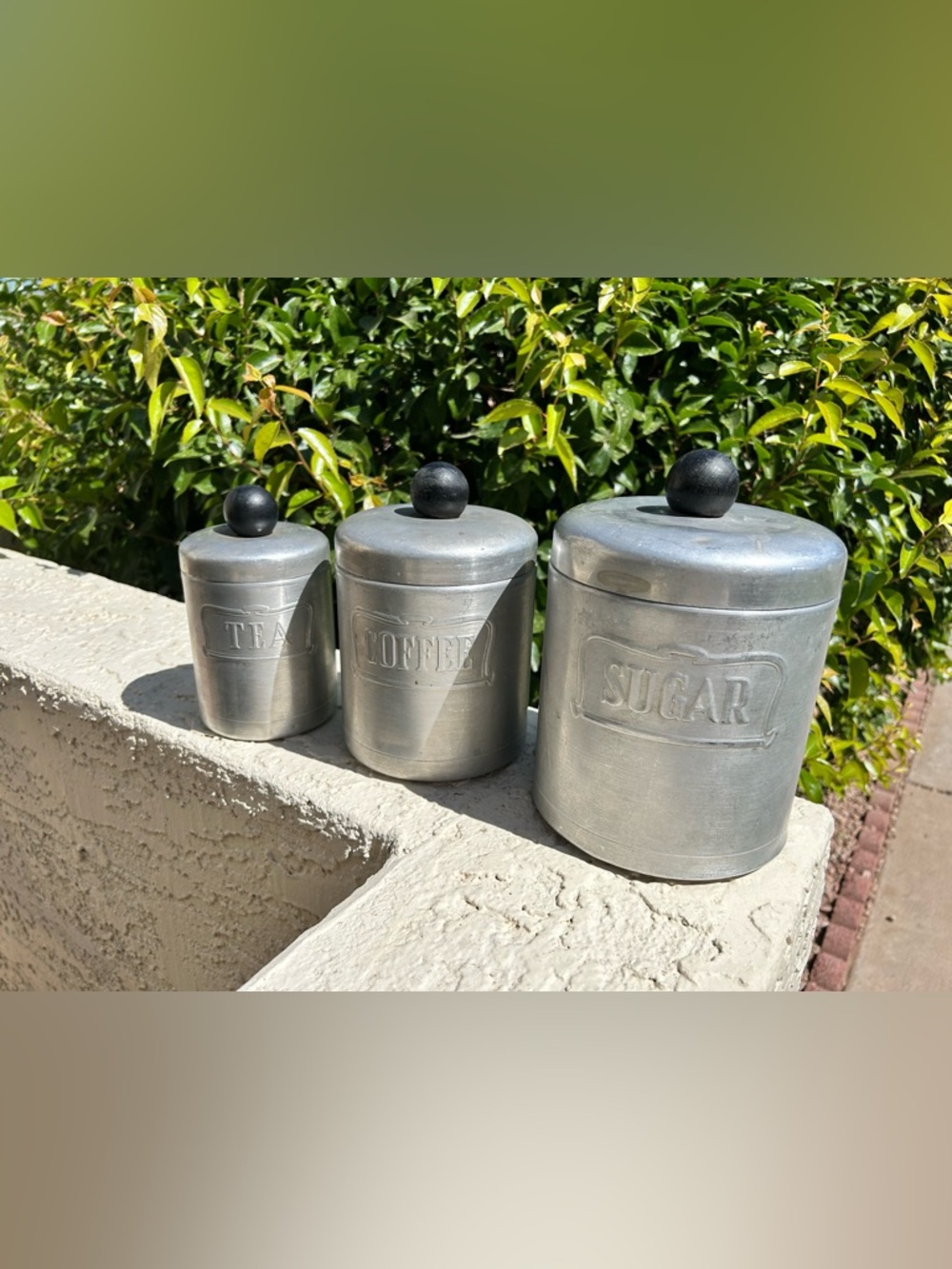 Set a vintage aluminum canister set